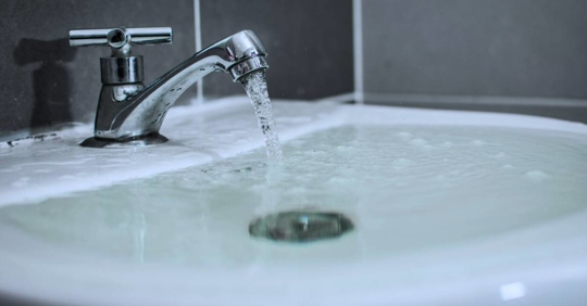 Bathroom Sink Full With Water